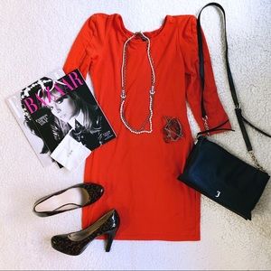 Orange Akira bodycon dress